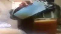Rekaman video tersembunyi merekam aksi seorang pembantu yang mencampur minuman majikan dengan air seni.