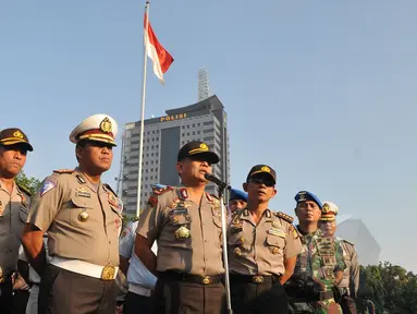 Polda Metro jaya menggelar Apel  "operasi patuh jaya 2015" di lapangan dit lantas Polda metro jaya yang dipimpin kapolda metro jaya Irjen Pol Unggung Cahyono, Jakarta, Rabu (27/5/2015). (Liputan6.com/Herman Zakharia)