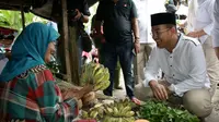 Cawagub Irwansyah melakukan blusukan ke Pasar Tradisional Muara Dua, Kabupaten OKU Selatan, Sumsel (dok.istimewa / Nefri Inge)