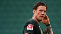 5. Wout Weghorst (14 gol) - Wout Weghorst mampu menunjukan penampilan apiknya di beberapa laga Wolfsburg. Weghorst telah mengkoleksi 14 gol di musim ini. (AFP/Swen Pfortner/pool)