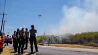 Kota Austin dan kabupaten tetangganya terus bergulat dengan gelombang panas yang berkepanjangan, dengan imbauan panas yang berlebihan dikeluarkan di seluruh negara bagian. (Brandon Bell/Getty Images/AFP)