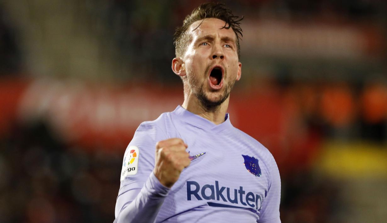 Barcelona berhasil memetik poin penuh kala bertandang ke markas Real Mallorca dalam duel pekan ke-19 La Liga 2021/2022, Senin (3/1/2022). (AP/Francisco Ubilla)