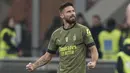 <p>Penyerang AC Milan Prancis Olivier Giroud berselebrasi setelah membuka skor saat menjamu Torino dalam duel pekan ke-22 Serie A 2022-2023, Sabtu (11/2/2023) dini hari WIB. AC Milan mengakhiri keterpurukannya di Liga Italia Serie A 2022/2023. (AP Photo/Antonio Calanni)</p>