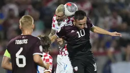 Krosia yang menang besar dengan skor 5-0 ketika menjamu Latvia. (AP Photo/Darko Bandic)