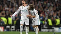Duo Real Madrid Lucas Vazquez dan Luka Modric. (AFP/Gabriel Bouys)