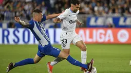 Girona FC ditahan imbang Deportivo Alaves dengan skor 2-2. (Ander Gillenea / AFP)