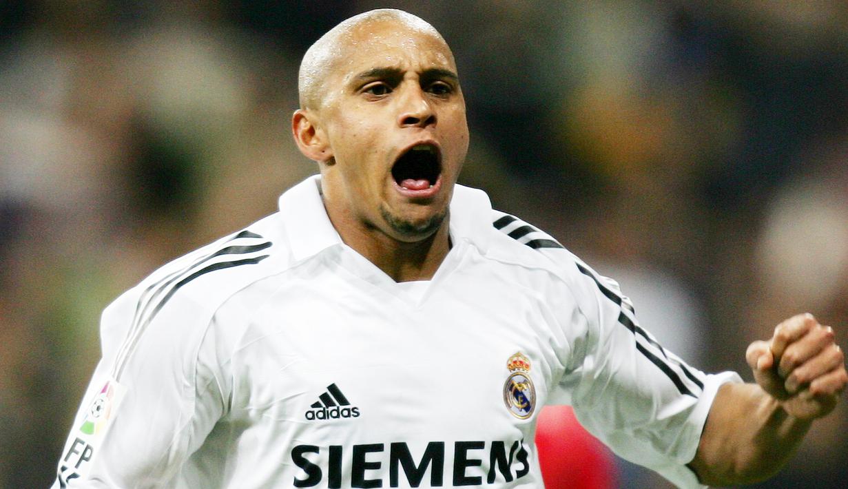 3. Roberto Carlos (Real Madrid) - Legenda timnas Brasil ini kesohor karena tendangan bebasnya yang fenomenal. Bek kiri Real Madrid mencetak 113 gol sepanjang karirnya. (AFP/Philippe Desmazes)