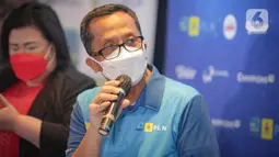 Executive Vice President Komunikasi Korporat dan CSR PLN, Agung Murdifi saat konferensi pers Proliga 2022 di Jakarta, Selasa (21/12/2021). Kompetisi bertajuk PLN Proliga 2022 akan dihelat di Padepokan Voli Jenderal Polisi Kunarto, Bogor dan dilaksanakan tanpa penonton. (Liputan6.com/Faizal Fanani)