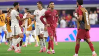 Bintang Timnas Portugal, Cristiano Ronaldo, meratapi kegagalan timnya setelah kalah 0-1 dari Spanyol di babak 16 besar Piala Dunia 2026, Selasa (7/7/2026). (Alex Slitz/Getty Images/AFP)