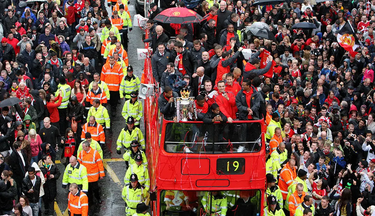 Pada tahun 2011, MU berhasil melangkahi koleksi gelar Liverpool. Saat itu Setan Merah meraih gelar mereka yang ke-19, sementara The Reds masih tertahan dengan koleksi 18 gelarnya. (AFP/Michael Jones)