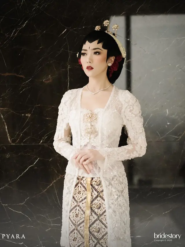 [Fimela] Pernikahan Isyana Sarasvati dan Rayhan Maditra