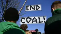 Unjuk rasa dalam COP 23 di Bonn yang meminta penggunaan batu bara untuk dihentikan (SASCHA SCHUERMANN / AFP)