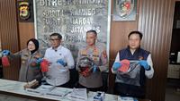 Polisi ungkap kasus penembakan ASN di Metro, Lampung. (Liputan6.com/Ardi Munthe).