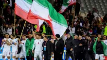 Para pemain dan tim teknis Iran merayakan kemenangan setelah pertandingan kualifikasi Piala Dunia FIFA 2026 zona Asia Grup A antara Iran dan Uzbekistan, pada 25 Maret 2025 di Teheran. (AFP)