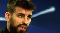 Bek Barcelona, Gerard Pique, bertekad membawa timnya mengalahkan Real Madrid di final Liga Champions. (EPA/Peter Powell)