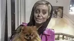 Sahar Tabar berpose bersama anjing berwarna coklat. Remaja 19 tahun ini rela merubah wajahnya menyerupai aktris Angelina Jolie dan Sahar Tabar telah melakukan operasi diwajahnya selama 50 kali. (Instagram/sahartabar_official)