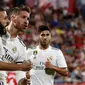 Para pemain Real Madrid merayakan gol ke gawang Girona pada laga La Liga di Stadion Municipal de Montilivi, Girona, Minggu (26/8/2018). (AFP/Pau Barrena Capilla)