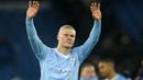 Pemain Manchester City, Erling Haaland merayakan kemenangan atas RB Leipzig pada laga lanjutan Grup G Liga Champions 2023/2024 yang berlangsung di Etihad Stadium, Manchester, Rabu (29/11/2023). (AP Photo/Dave Thompson)