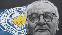 Mural dari manajer Leicester, Claudio Ranieri, yang dibuat oleh suporter. Mantan manajer Chelsea ini dianggap pahlawan oleh para penggemar dari The Foxes karena keberhasilannya meraih gelar Liga Inggris musim 2015/2016. (EPA/Facundo Arrizabalaga)