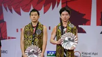 Ganda putra andalan Indonesia Marcus Fernaldi Gideon/Kevin Sanjaya Sukamuljo harus menelan pil pahit seusai gagal menjadi juara ajang bulutangkis HSBC BWF World Tour Finals 2021. (PBSI Media)