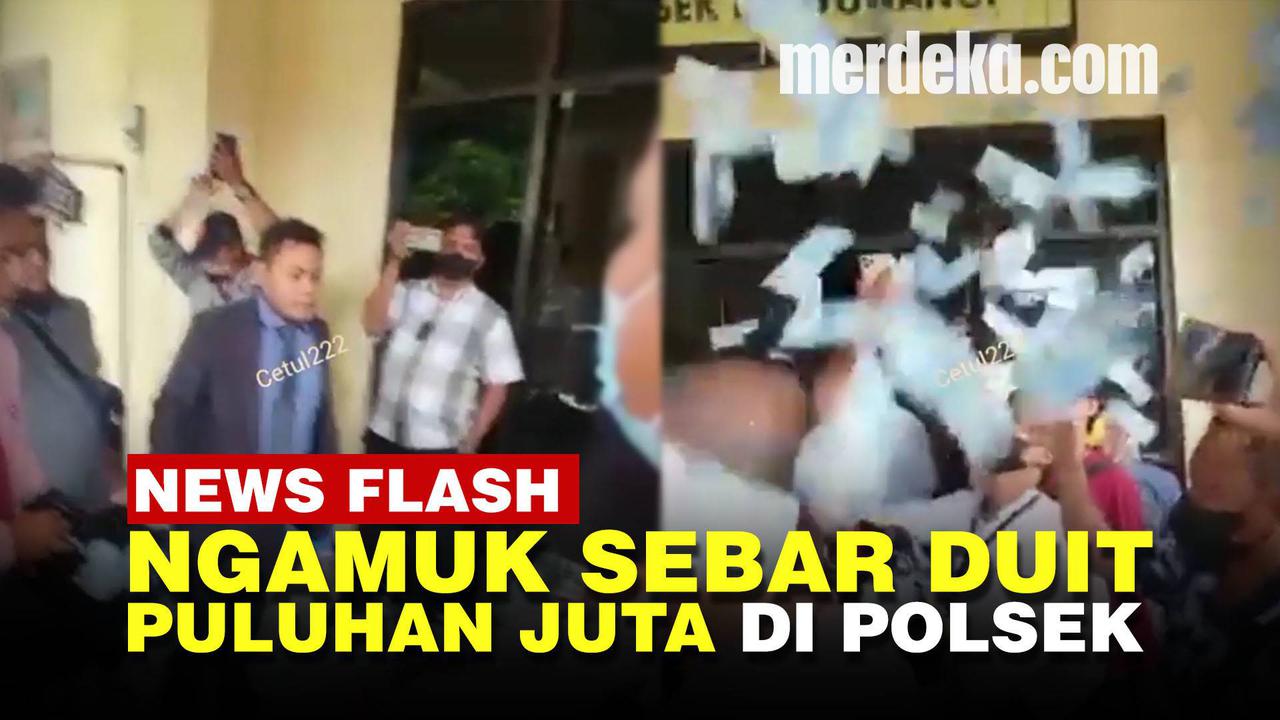 VIDEO: Pengacara Sebar Uang Puluhan Juta di Mapolsekta Banyuwangi