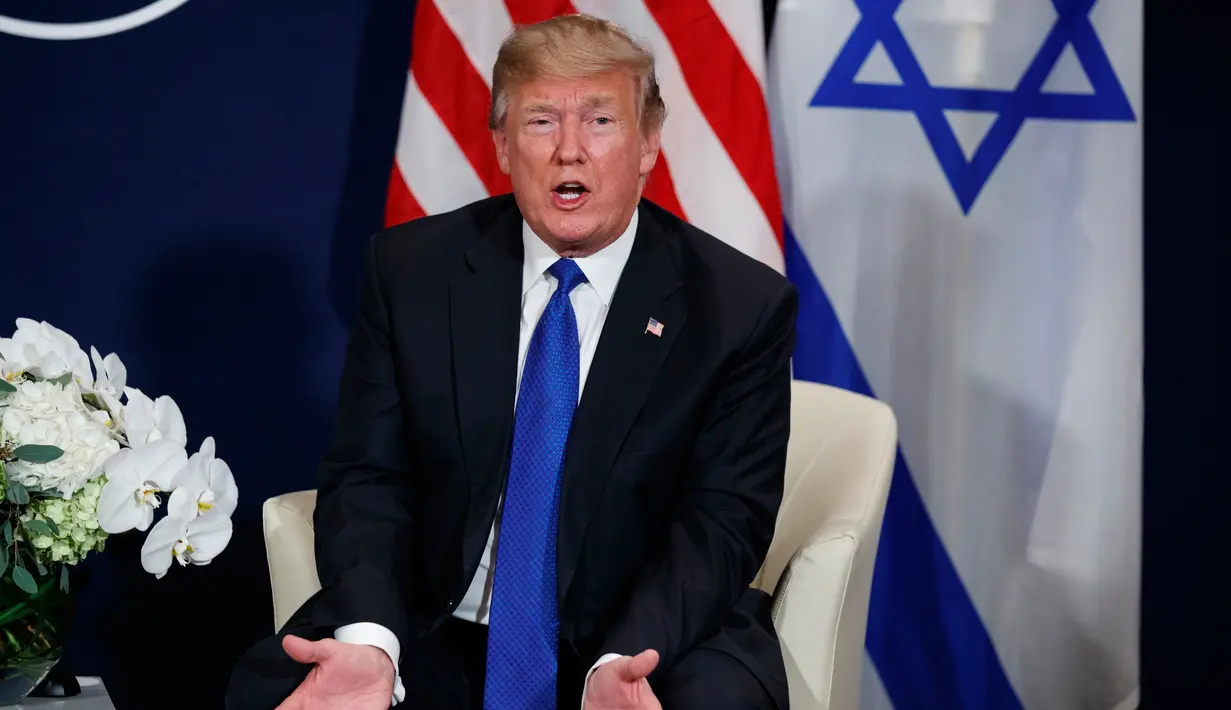 Presiden AS Donald Trump di sela Forum Ekonomi Dunia, Davos (25/1). Dalam pertemuannya Trump mengatakan Palestina sudah 'tidak menghormati' terkait keputusan kontroversialnya mengakui Yerusalem sebagai ibu kota Israel. (AP Photo / Evan Vucci)