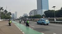 Situasi arus lalu lintas menuju Gedung DPR RI. (Liputan6.com/Radityo Priyasmoro)