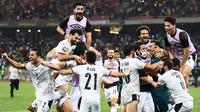 Eksekusi Mohammed Salah memastikan kemenangan 5-4 Mesir di babak adu penalti. The Pharaohs lolos ke perempatfinal Piala Afrika 2021 dan akan menghadapi Maroko. (AFP/Charly Triballeau)