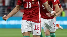 Bek Hungaria Zsolt Nagy melakukan selebrasi usai mencetak gol ke gawang Jerman pada pertandingan grup A3 UEFA Nations League di Puskas Arena di Budapest, Minggu (12/6/2022). Hasil imbang ini membuat Jerman menduduki tempat ketiga klasemen grup dengan tiga poin, sedangkan Hungaria mengumpulkan empat poin. (AFP/Attila Kisbenedek)