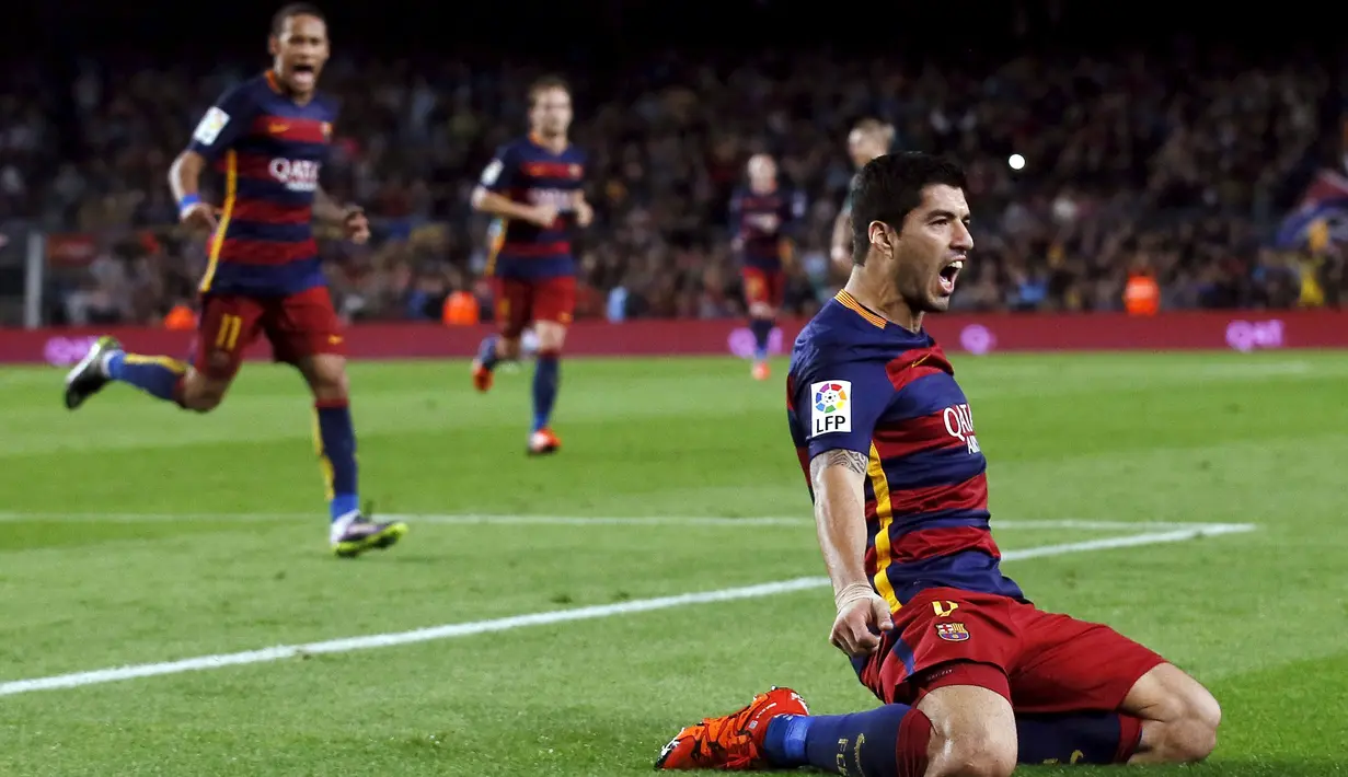 Ekspresi Luis Suarez setelah mencetak gol ketiga ke gawang Eibar dalam laga La Liga Spanyol di Stadion Camp Nou, Barcelona, Senin (26/10/2015) dini hari WIB. (Reuters/Albert Gea)