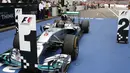 Pembalap F1 dari tim Mercedes, Nico Rosberg, tampil tercepat di GP Jerman yang dihelat di Sirkuit Hockenheim, (20/7/2014), dengan total catatan waktu 1 jam 33 menit 42,914 detik. (REUTERS/Michael Dalder)