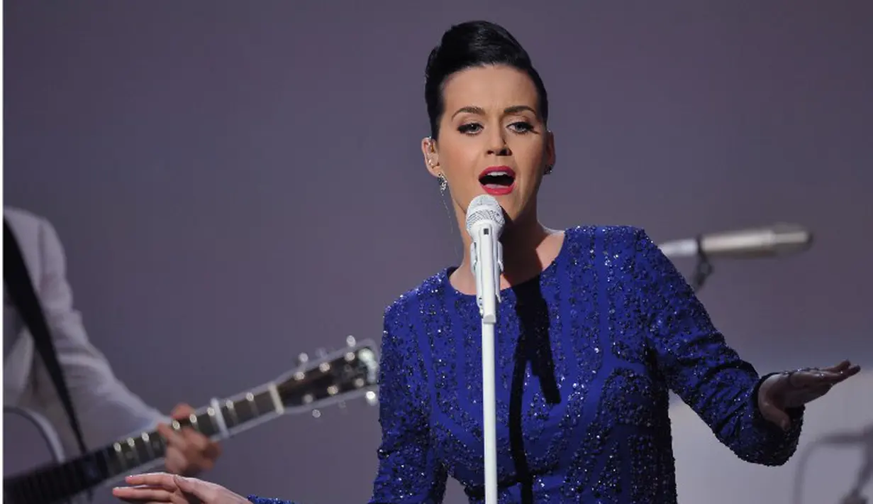 Penyanyi Katy Perry tampil di konser perayaan ajang Special Olympics di Gedung Putih, Washington, Kamis (31/7/14). (AFP PHOTO/Mandel NGAN)