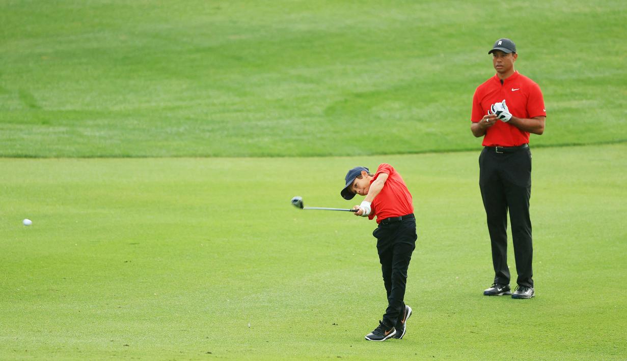 Charlie Woods mengungguli semua anak laki-laki yang berkompetisi di kategori 11 tahun, menembakan 3-under 33 di sembilan lubang, sambil finis dengan tiga birdie. (Mike Ehrmann/Getty Images/AFP)