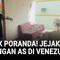 Warga di negara bagian La Guaira, Venezuela, menyusuri puing-puing bangunan permukiman yang rusak parah pada Minggu, sehari setelah Presiden Nicolás Maduro digulingkan dan ditangkap dalam operasi militer Amerika Serikat.
