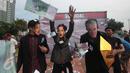 Sejumlah mahasiswa menggelar aksi teaterikal Skandal Freeport di bundaran Patung Kuda, Jakarta, Minggu (27/12/2015). Aksi tersebut sebagai bentuk sindiran kepada pemerintah terkait kasus Freeport. (Liputan6.com/Angga Yuniar)