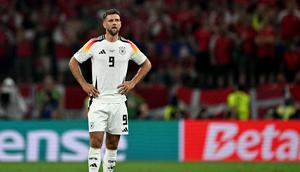 Niclas Fullkrug mulai bermain untuk Borussia Dortmund pada 2023. Namun, Fullkrug tak masuk dalam skema pelatih Dortmund Nuri Sahin pada musim ini. Pemain asal Jerman itu akhirnya dijual ke klub Premier League West Ham. West Ham mengeluarkan 27 juta euro untuk mendapatkan striker 31 tahun tersebut. (OZAN KOSE / AFP)