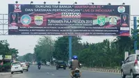 Martapura FC sukses meraih rating dan share tinggi selama fase penyisihan grup Piala Presiden berkat baliho di lokasi strategis di Banjarmasin dan Kabupaten Banjar. (Bola.com/Robby Firly)