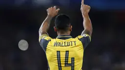 Theo Walcott mencetak dua gol untuk Arsenal saat mengalahkan FC Basel pada laga grup A Liga Champions di Emirates Stadium, Kamis (29/9/2016) dini hari WIB. (Reuters/Stefan Wermuth)