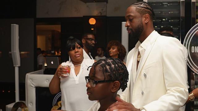 Dwyane Wade bersama anaknya