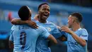 Gelandang Manchester City, Raheem Sterling, merayakan gol yang dicetaknya ke gawang Real Madrid pada laga leg kedua 16 besar Liga Champions di Etihad Stadium, Sabtu (8/8/2020) dini hari WIB. Manchester City menang 2-1 atas Real Madrid. (AFP/Dave Thompson/pool)