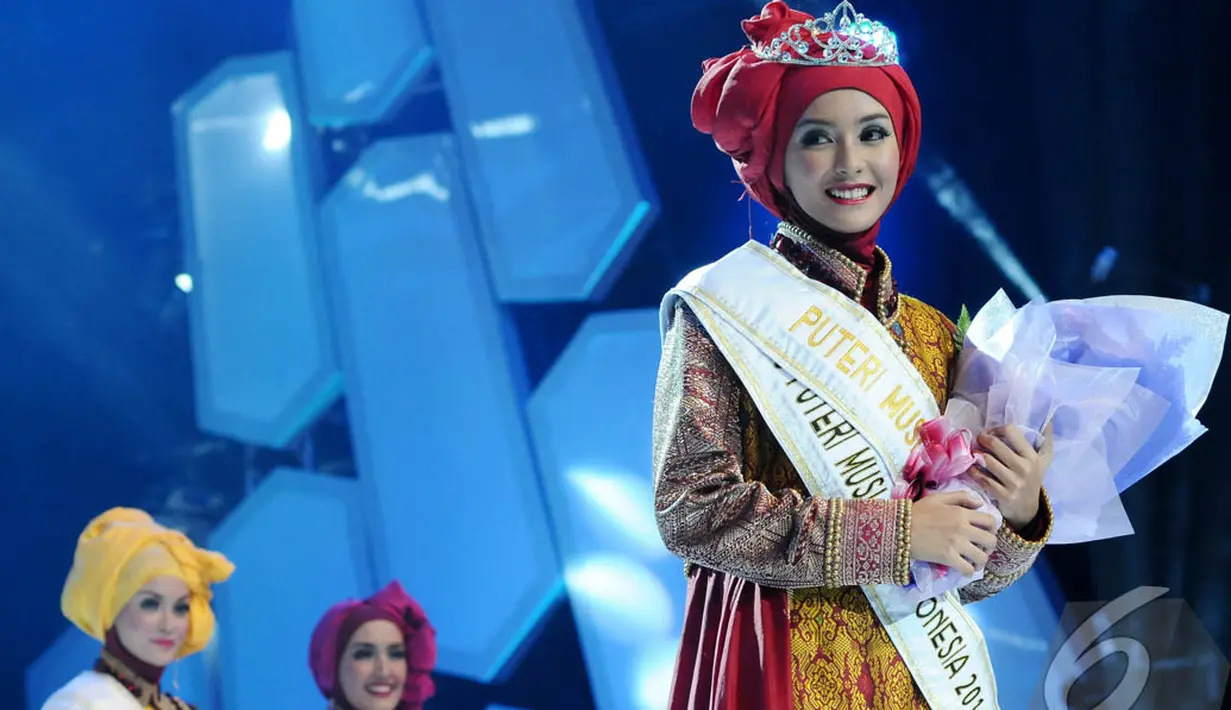 Siti Nurmelia Baskarani mengaku tidak menyangka akan menjuarai Malam Puncak Putri Muslimah Indonesia 2014 (Liputan 6.com/Andrian M Tunay)
