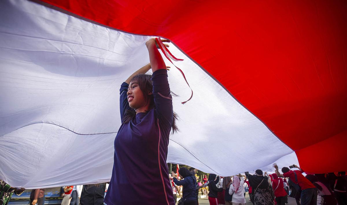 Ribuan Warga Bogor Ikuti Kirab Bendera Merah Putih Raksasa
