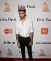 Sebagai salah satu pelaku public figur tentunya penampilan harus sempurna secara head to toe. Berbeda dengan Zayn Malik, dirinya mengalami bad day hingga salah memakai sepasang sepatu, kok bisa?. (AFP/Bintang.com) 