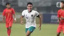 Pemain belakang Timnas Indonesia U-19, Muhammad Ferrari merayakan golnya pada laga grup A Piala AFF U-19 2022 melawan Myanmar U-19 di Stadion Patriot Candrabhaga, Bekasi, Jawa Barat, Minggu (10/7/2022). Meski berhasil menundukkan Myanmar U-19 5-1, namun Timnas Indonesia U-19 gagal melaju ke semifinal. (Liputan6.com/Helmi Fithriansyah)