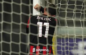 Pemain AC Milan, Christian Pulisic, bereaksi setelah gagal memanfaatkan peluang dalam pertandingan Serie A antara Parma dan AC Milan di Parma, Italia, Sabtu, 8 November 2025. (Massimo Paolone/LaPresse via AP)