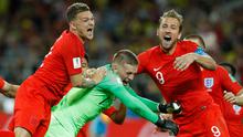 Pemain timnas Inggris, Harry Kane, Jordan Pickford dan Kieran Trippier merayakan akhir laga 16 besar Piala Dunia 2018 melawan Kolombia di Stadion Spartak, Selasa (3/7). Inggris lolos ke perempat final setelah menang adu penalti 4-3. (AP/Victor R. Caivano)