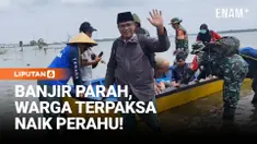 Aktivitas warga Desa Karangrowo, Kecamatan Jakenan, Kabupaten Pati, Jawa Tengah, terganggu akibat banjir yang merendam seluruh akses jalan menuju desa. Genangan air yang meluas membuat wilayah tersebut tampak seperti lautan.
