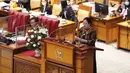 Ketua DPR Puan Maharani memberikan pidato pada Rapat Paripurna ke-11 Masa Persidangan II Tahun Sidang 2021-2022 di Kompleks Parlemen, Jakarta, Kamis (16/12/2021). 2021-2022. (Liputan6.com/Angga Yuniar)