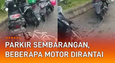 Sederet motor parkir sembarangan di pinggir jalan dirantai dan digembok mengundang perhatian