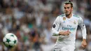 Manchester United dan Tottenham dikabarkan tengah berlomba berebut tanda tangan pemain Real Madrid asal Welsh, Gareth Bale. Beberapa media Spanyol menyebut rencana Gareth bale untuk meninggalkan Madrid pada bursa transfer Januari 2018. (AFP/Gabriel Bouys)